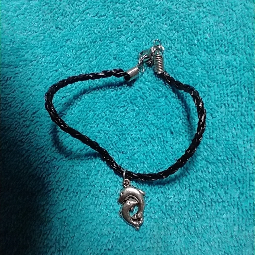 Black braided cord silvertone dolphins couple bracelet